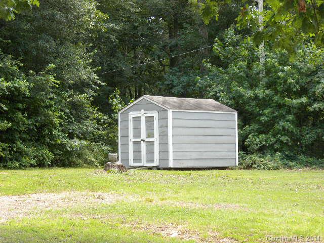 6918 Medlin Road Monroe, NC 28112 - Photo 2 of 11 a view of a back yard of the house