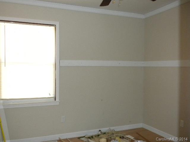 6918 Medlin Road Monroe, NC 28112 - Photo 9 of 11 a small space with a window