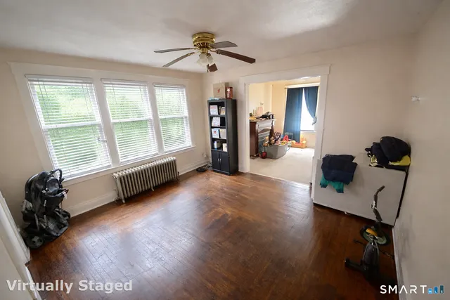a kitchen with stainless steel appliances granite countertop a refrigerator and a stove