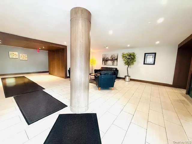 a living room with furniture and a couch