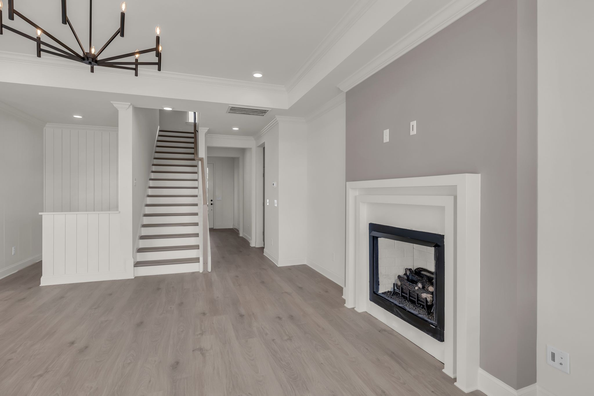 207 Phillips Bend Spring Hill, TN 37174 - Photo 19 of 55 wooden floor in an empty room with a fireplace
