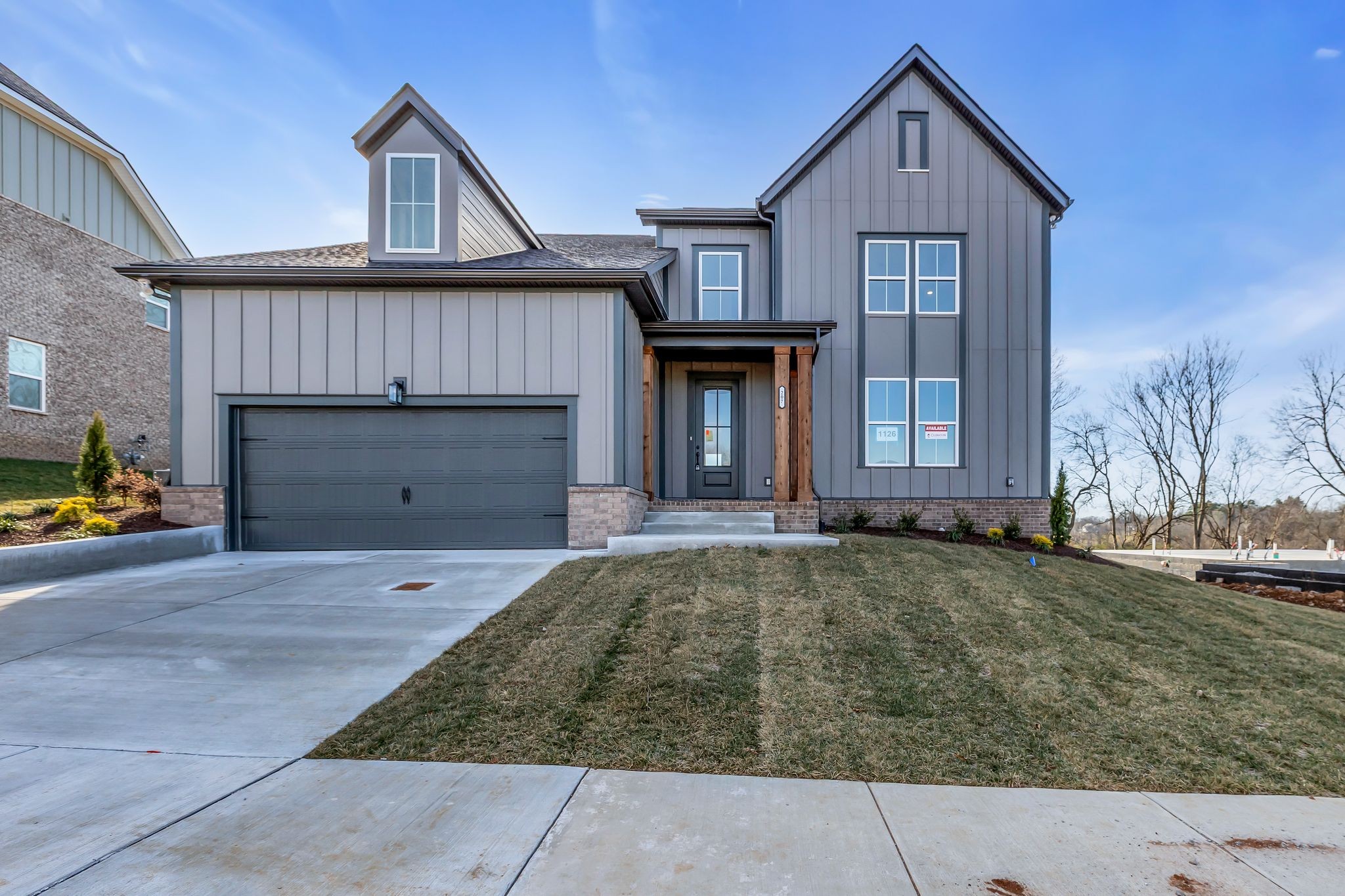 207 Phillips Bend Spring Hill, TN 37174 - Photo 2 of 55 a front view of a house with a yard