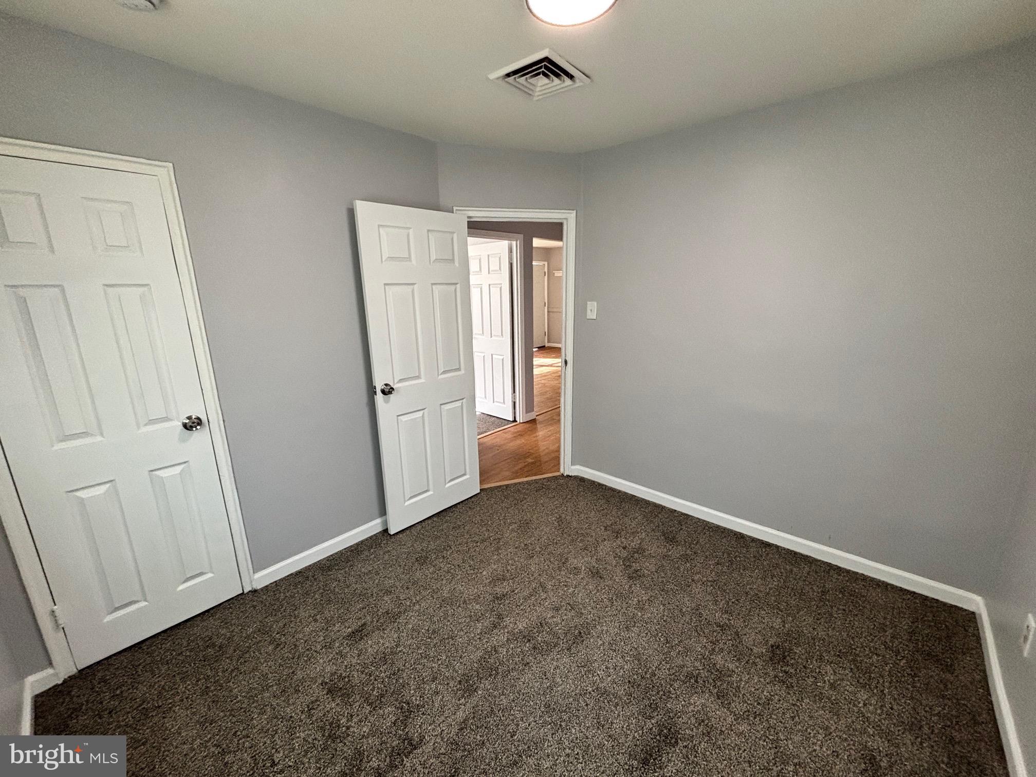 164 Kinsley Road Pemberton, NJ 08068 - Photo 15 of 15 an empty room with windows