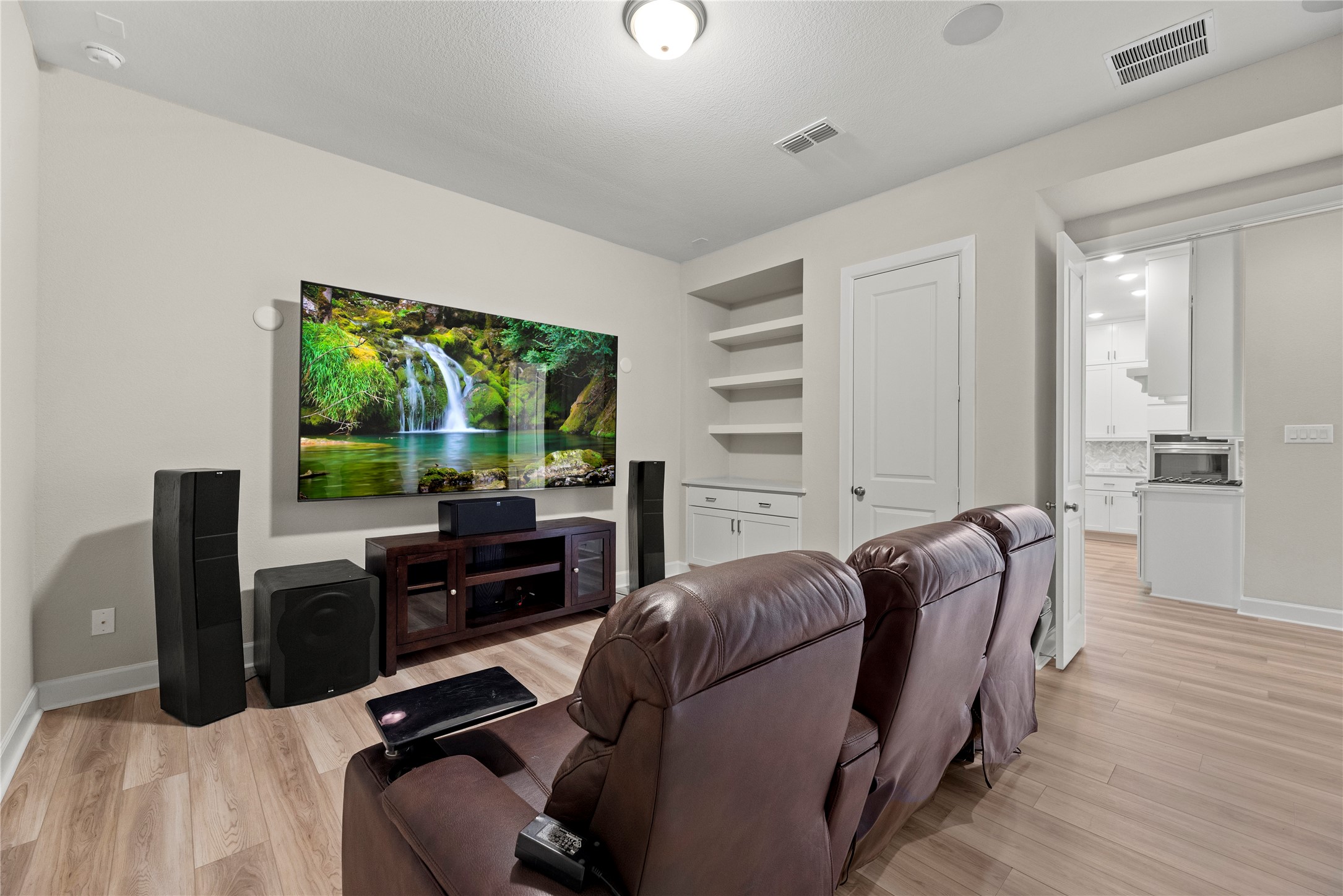 3111 Swift Way Katy, TX 77493 - Photo 21 of 50 a living room with furniture and a flat screen tv