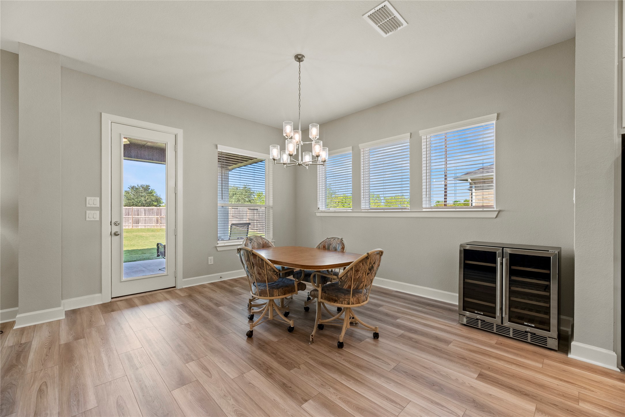 3111 Swift Way Katy, TX 77493 - Photo 31 of 50 a dining room with furniture window and wooden floor