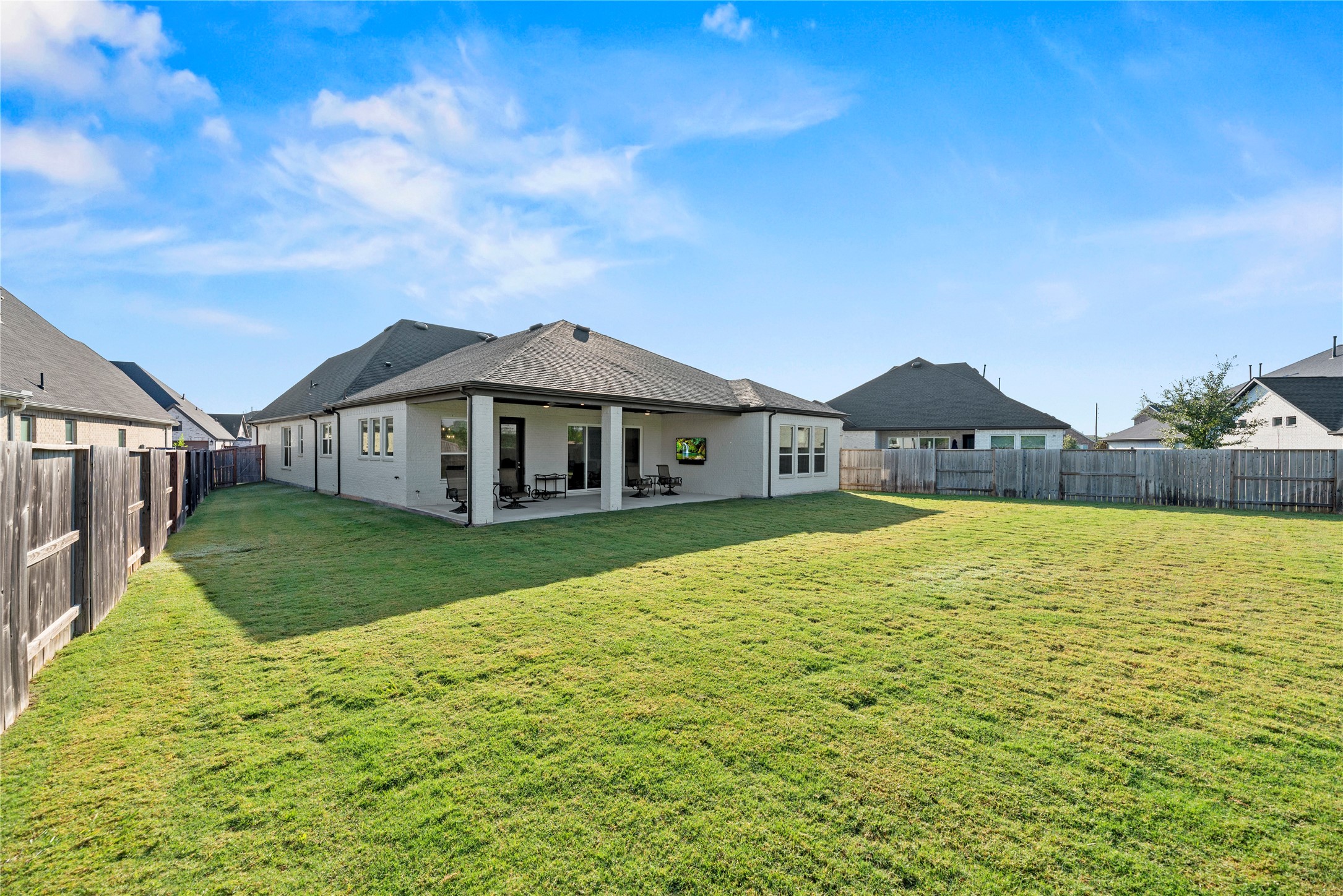 3111 Swift Way Katy, TX 77493 - Photo 48 of 50 a yellow and red house covered with tall trees
