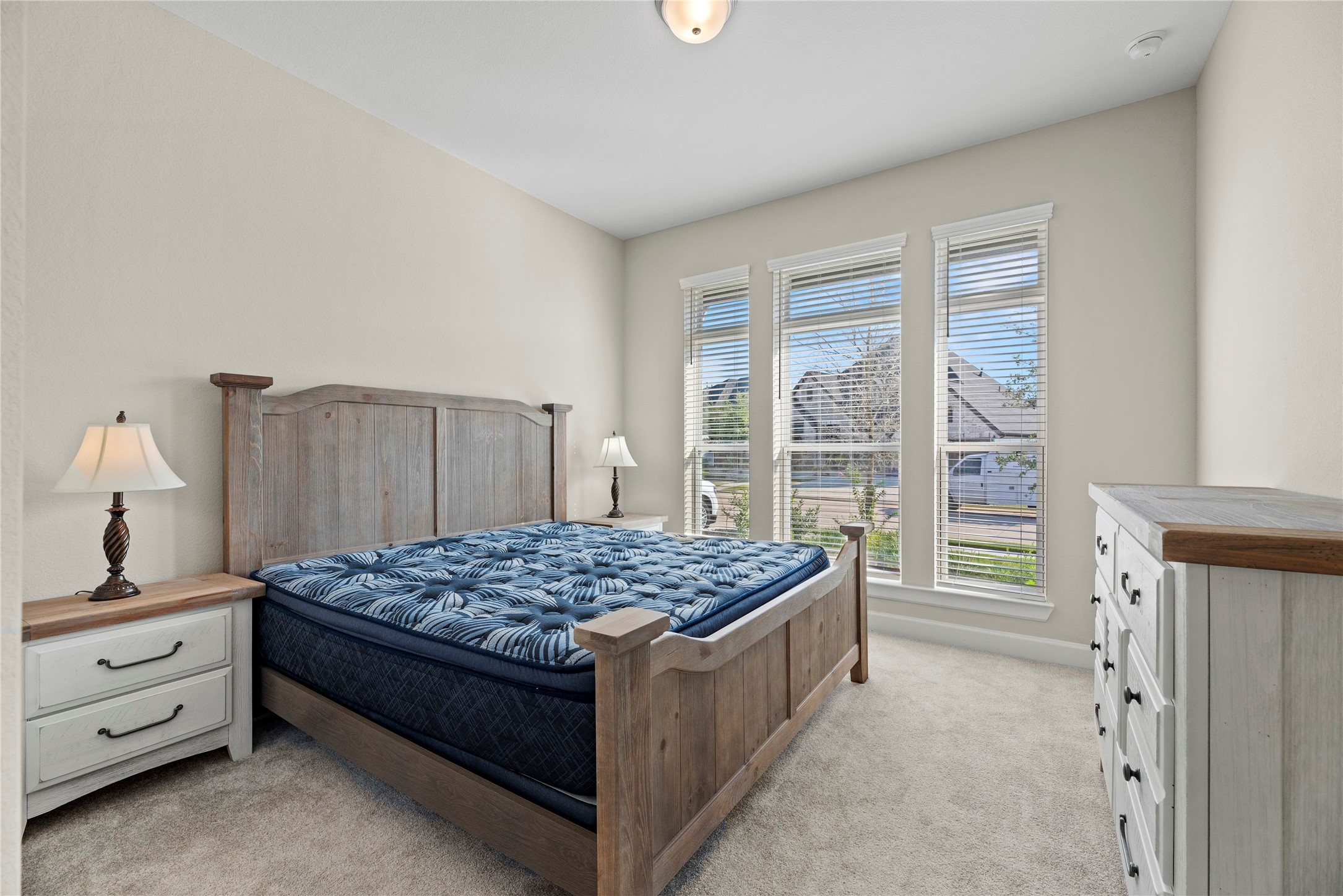 3111 Swift Way Katy, TX 77493 - Photo 8 of 50 a bedroom with a bed and a window