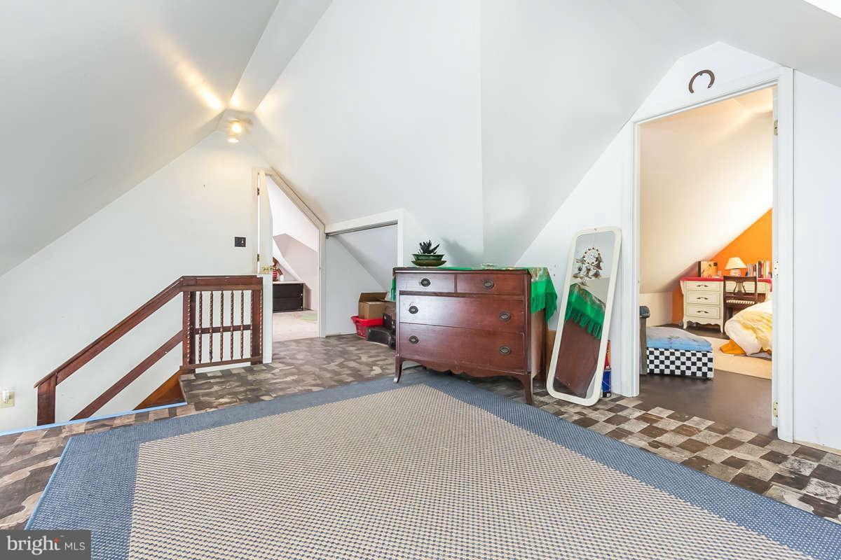 4604 Schenley Road Baltimore, MD 21210 - Photo 20 of 30 a room with stairs and white walls