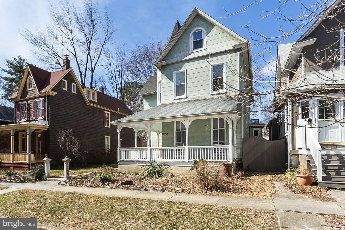 4604 Schenley Road Baltimore, MD 21210 - Photo 30 of 30 a front view of a house with a yard covered in snow