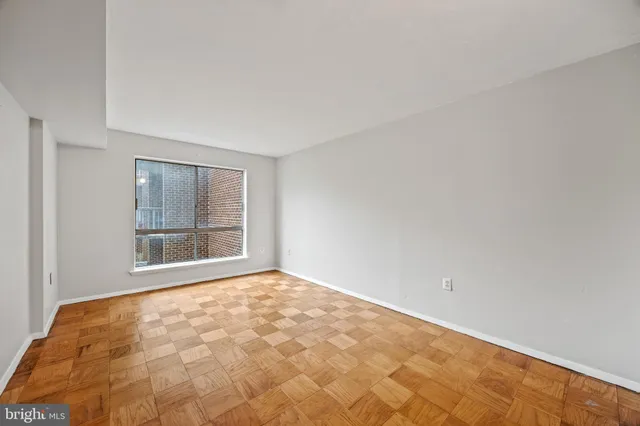 a view of an empty room and window