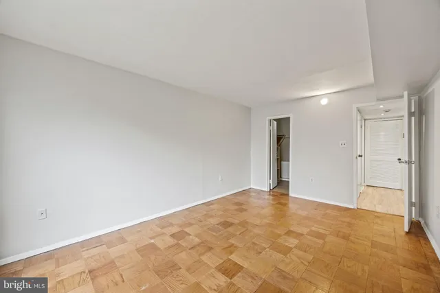 a view of a room with wooden walls