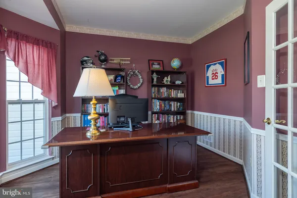 a view of a workspace with furniture and toys