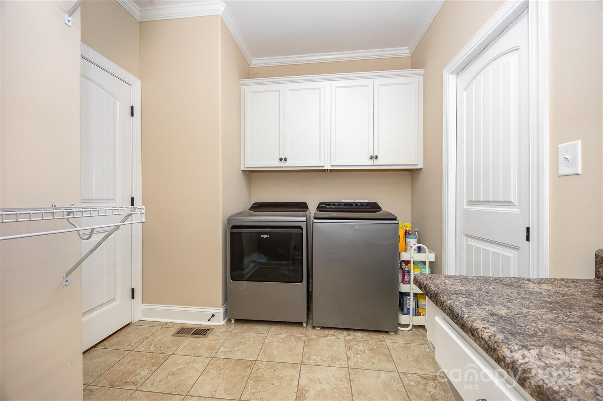 375 Pebblestone Court Lexington, NC 27295 - Photo 14 of 34 a view of a kitchen with fridge and wooden floor