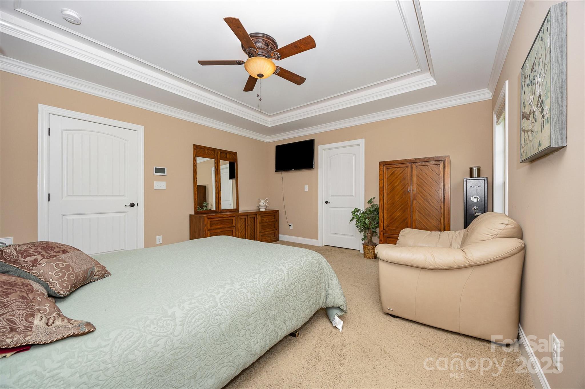375 Pebblestone Court Lexington, NC 27295 - Photo 17 of 34 a bedroom with a large bed couch and a window