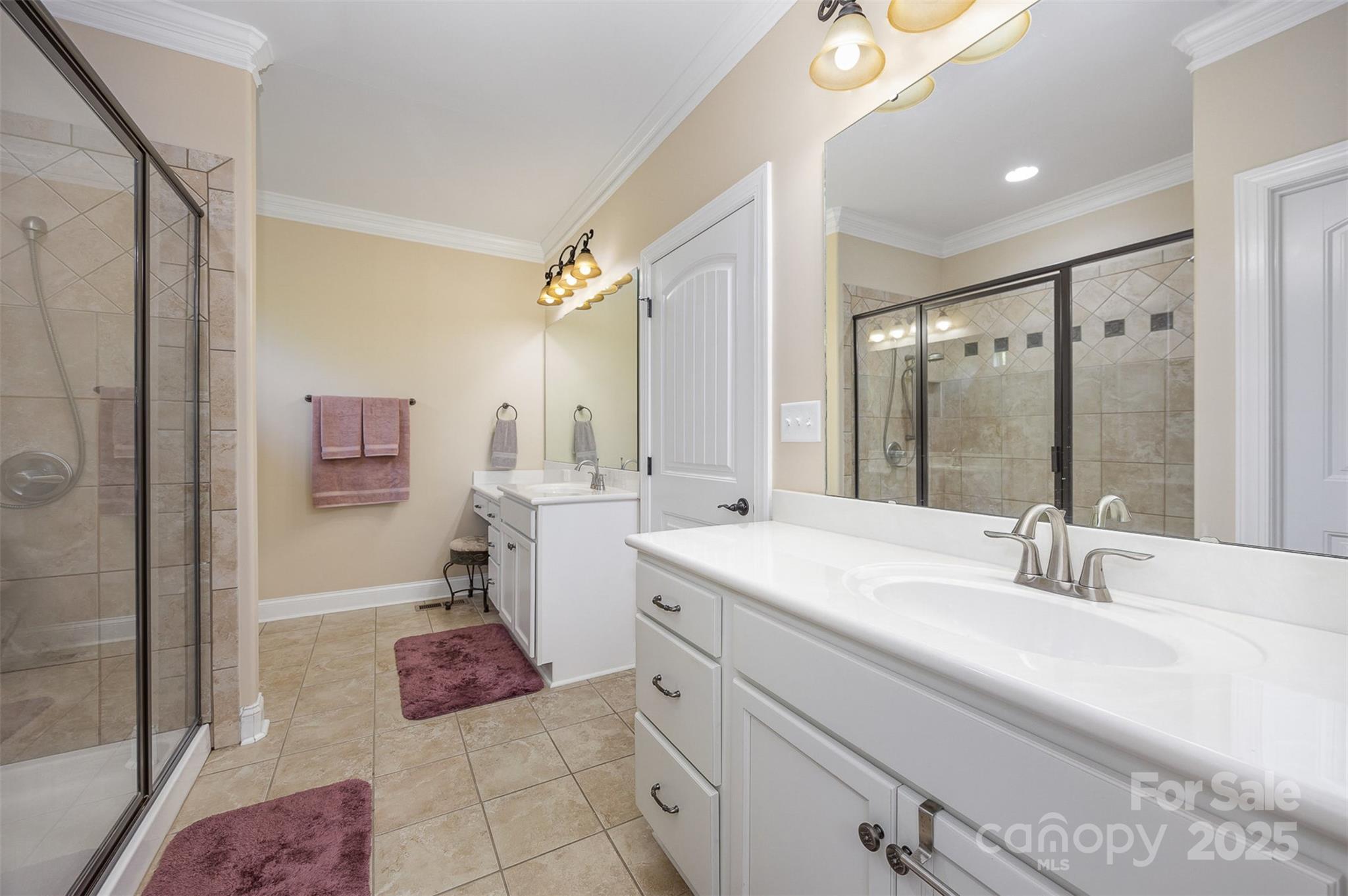 375 Pebblestone Court Lexington, NC 27295 - Photo 18 of 34 a spacious bathroom with a double vanity sink mirror and shower