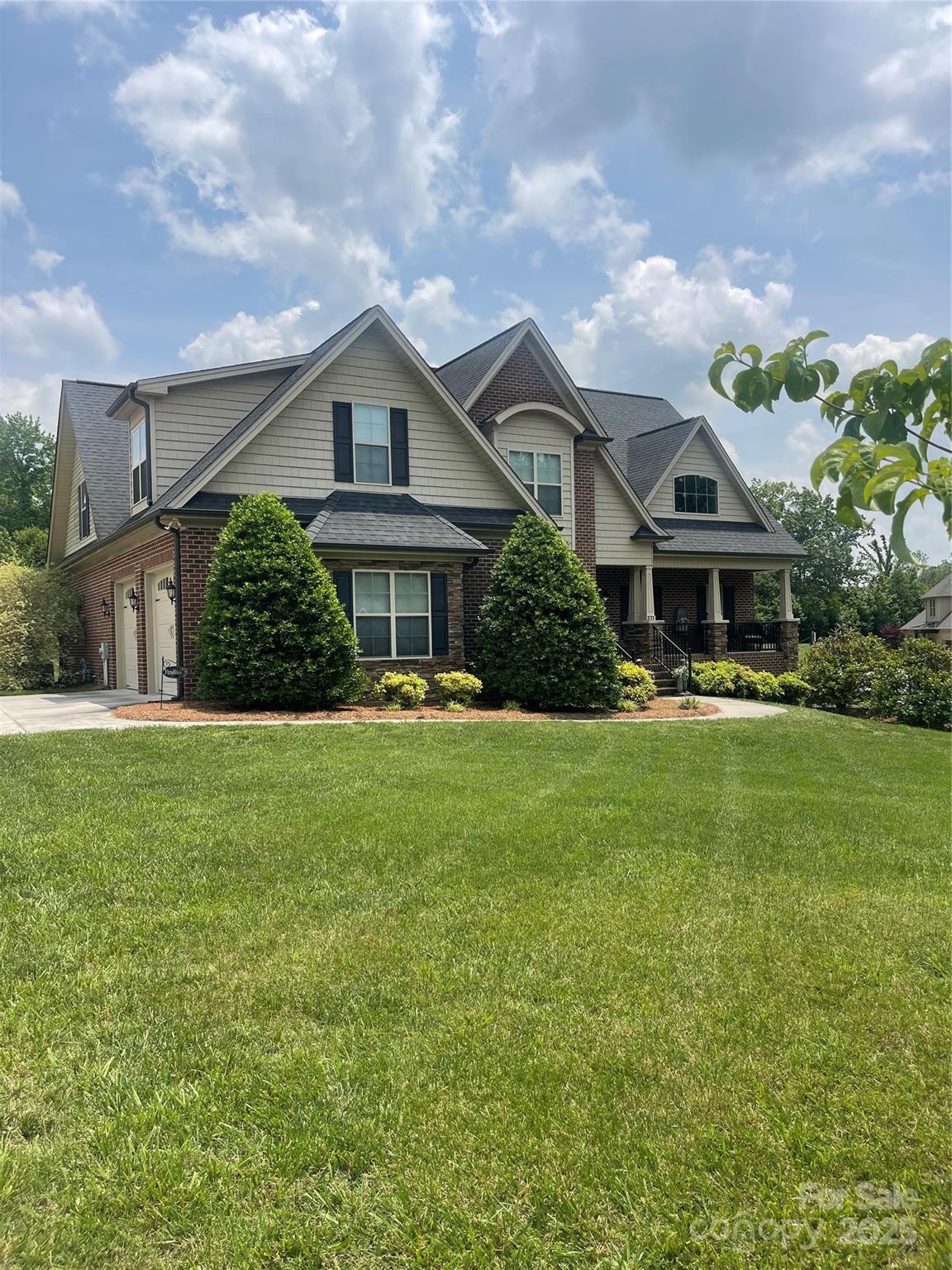 375 Pebblestone Court Lexington, NC 27295 - Photo 2 of 34 a front view of a house with a yard