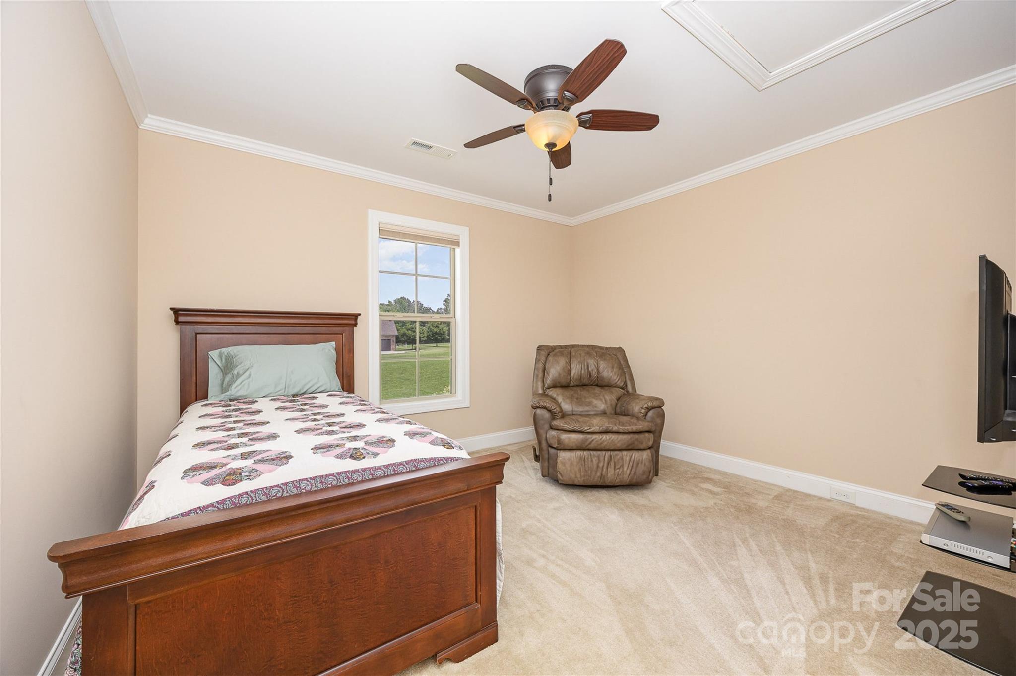 375 Pebblestone Court Lexington, NC 27295 - Photo 21 of 34 a bedroom with a bed and a couch