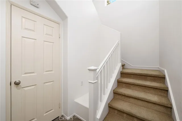 a view of staircase with white walls and white walls