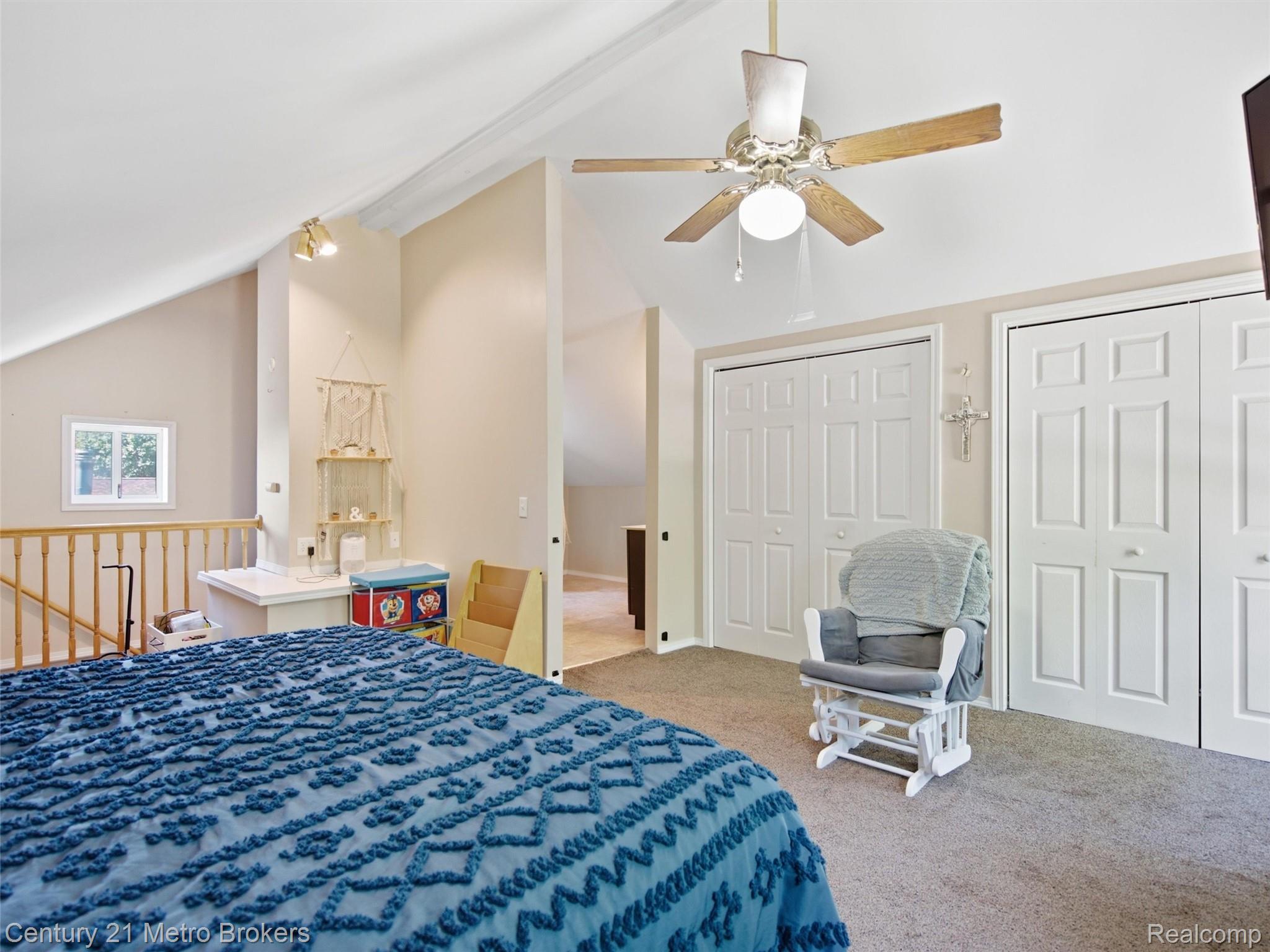 301 Field Road Clio, MI 48420 - Photo 14 of 29 Vaulted ceiling with a ceiling fan and light fixture