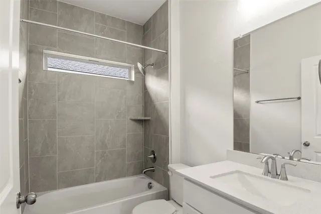 a view of a house with a yard and a garden