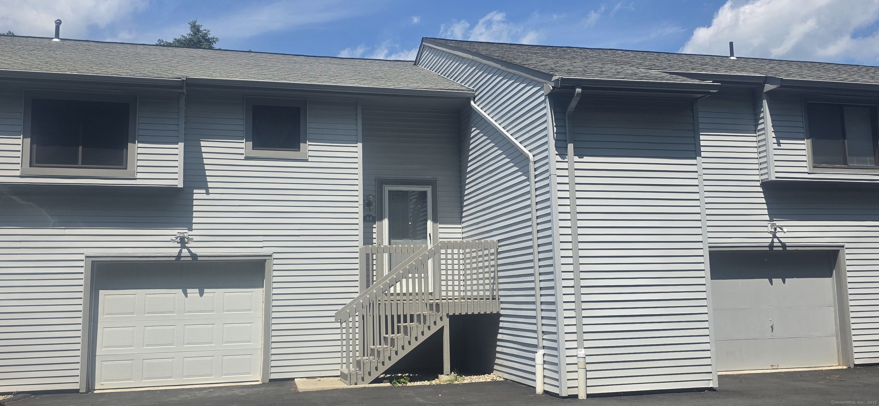 a view of a house with white door