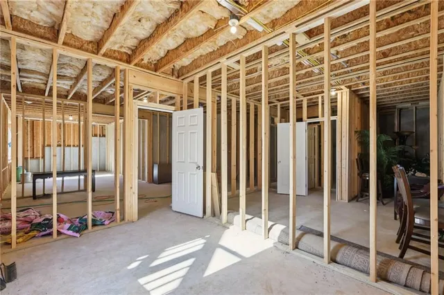 a view of a room with wooden frame