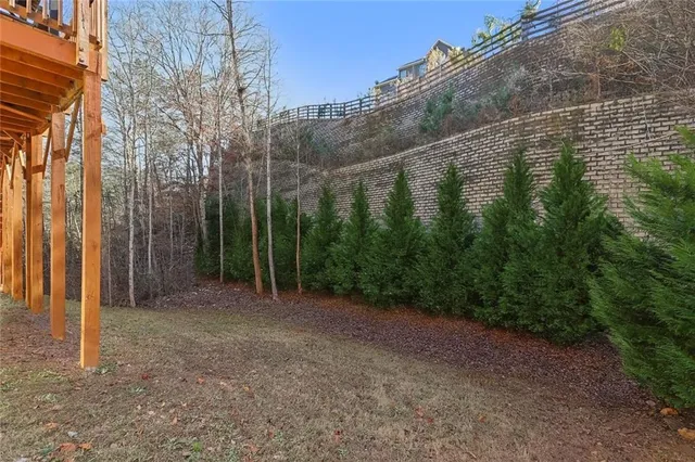 a view of a forest with a house