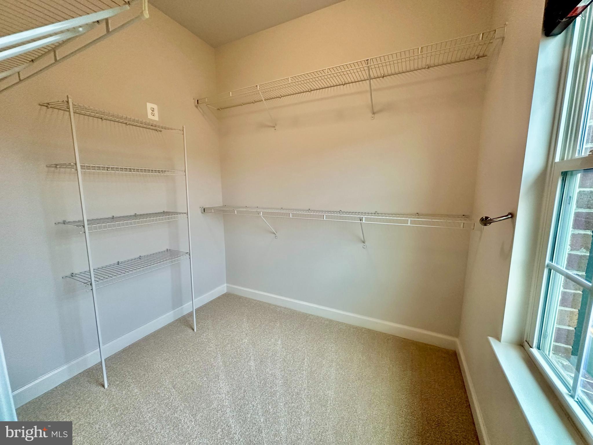 3606 Holborn Place Frederick, MD 21704 - Photo 17 of 30 a view of a room with racks on the wall