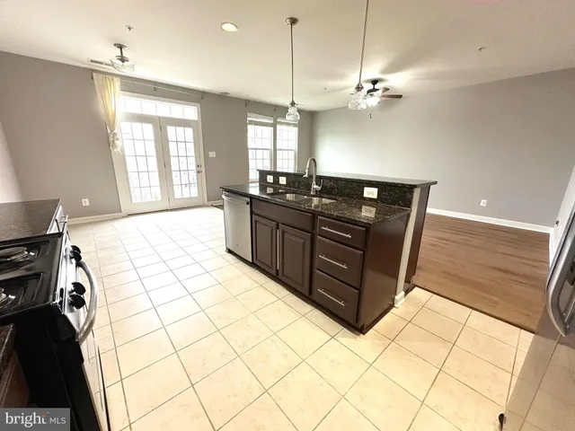 a kitchen with a cabinets and appliances
