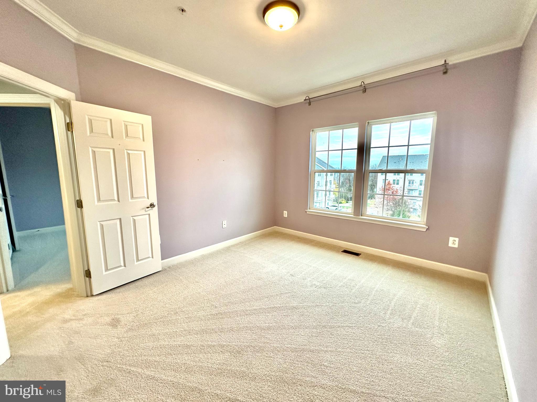 3606 Holborn Place Frederick, MD 21704 - Photo 10 of 30 an empty room with windows