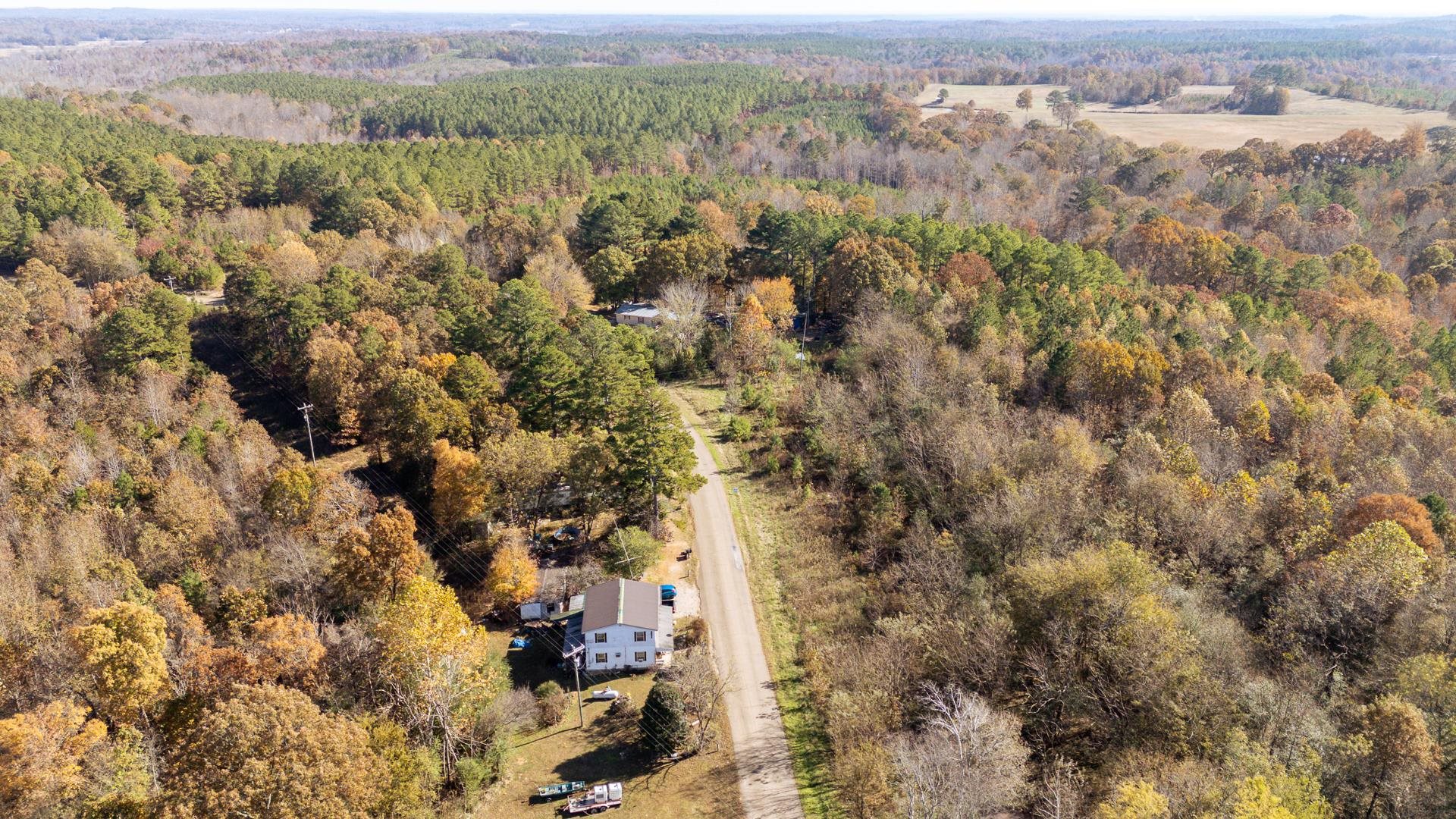 8069 Old Stage Road Adamsville, TN 38310 - Photo 25 of 34 view of city and mountain