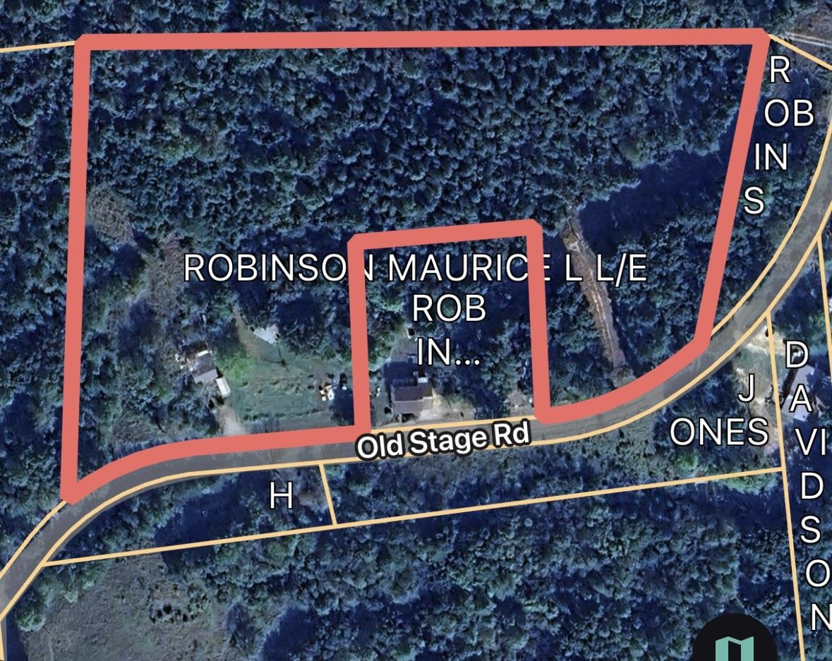 8069 Old Stage Road Adamsville, TN 38310 - Photo 34 of 34 a sign on the side of a road