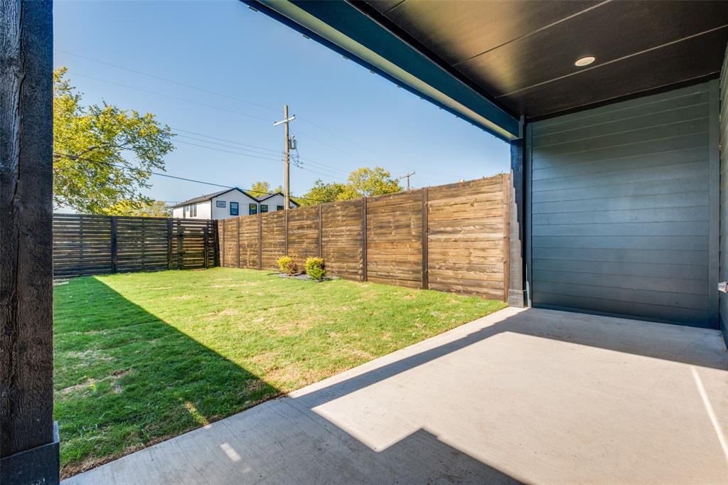 2424 Jeffries Street Dallas, TX 75215 - Photo 26 of 28 Fenced backyard with a patio