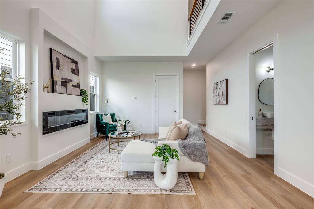 2424 Jeffries Street Dallas, TX 75215 - Photo 5 of 28 Living area featuring light wood-style flooring and recessed lighting
