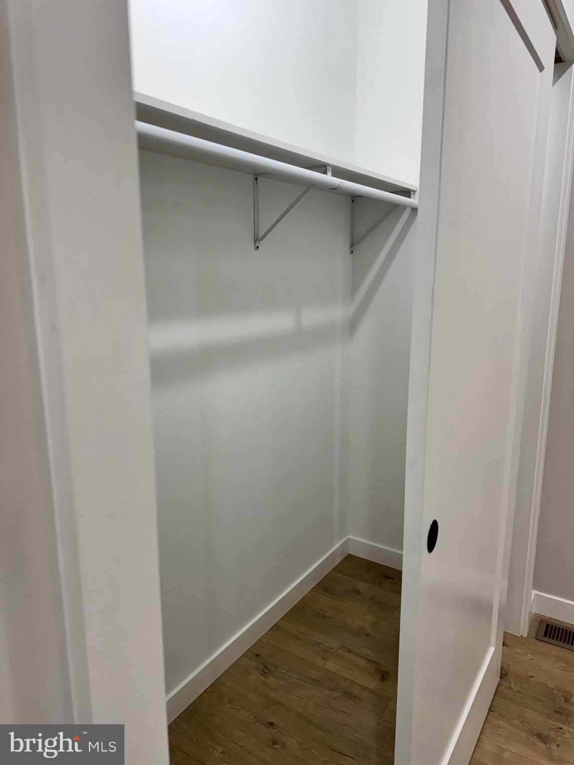 2256 North 9th Street, Unit 1 Philadelphia, PA 19133 - Photo 13 of 29 a view of walk in closet with wooden floor