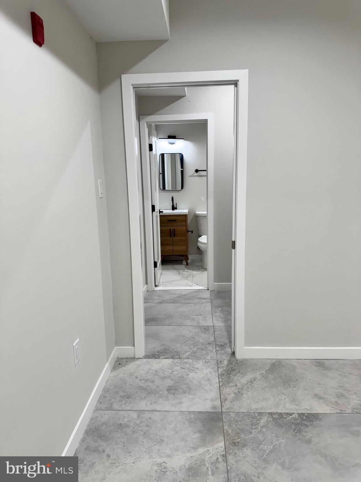 2256 North 9th Street, Unit 1 Philadelphia, PA 19133 - Photo 18 of 29 a view of bedroom and bathroom