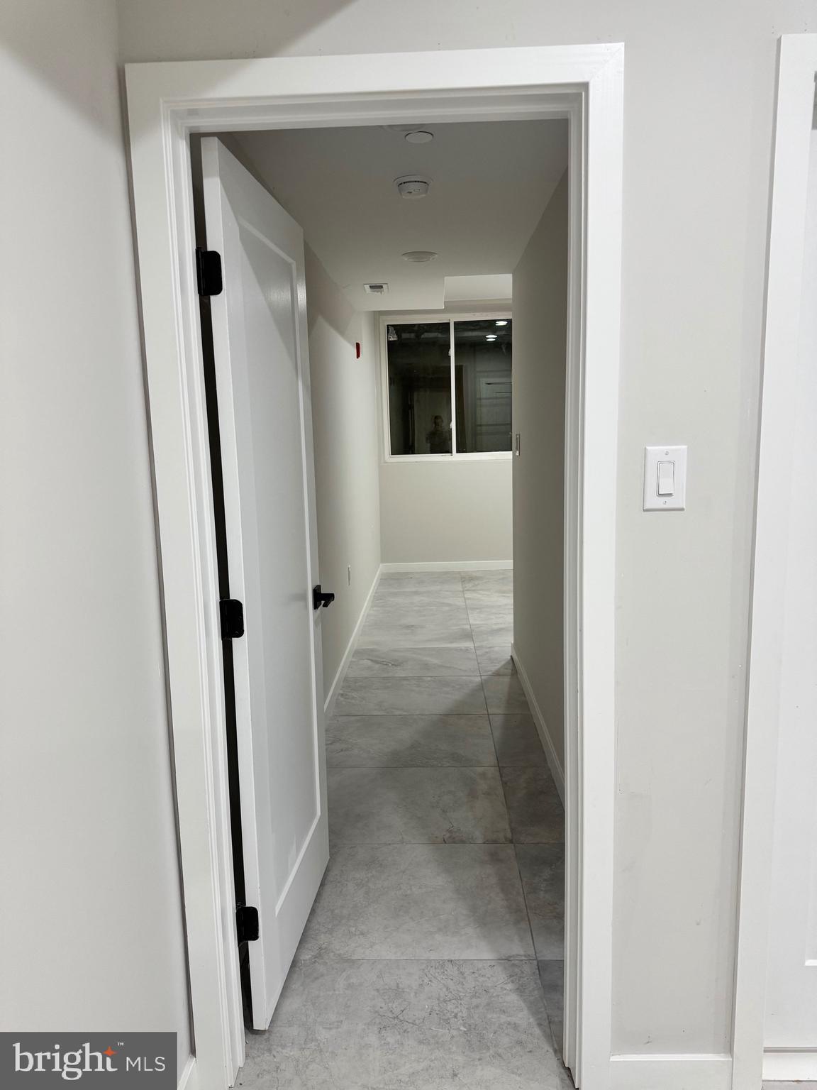 2256 North 9th Street, Unit 1 Philadelphia, PA 19133 - Photo 26 of 29 a view of a hallway with wooden floor and entryway
