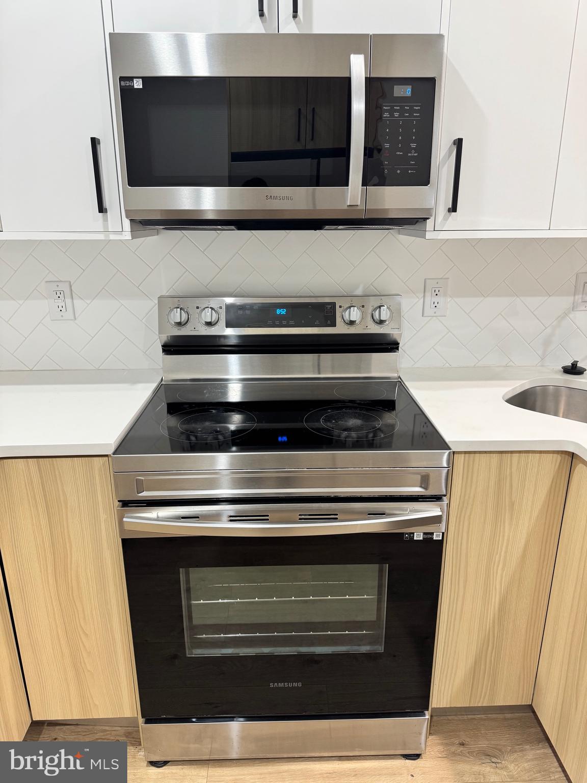 2256 North 9th Street, Unit 1 Philadelphia, PA 19133 - Photo 6 of 29 a stove top oven sitting inside of a kitchen