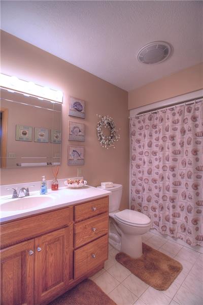 105 Rochelle Lane Monaca, PA 15061 - Photo 14 of 25 Second floor FULL BATH 11x5 The second floor bath is shared by Bedroom 3 and Bedroom 4. The bathroom was updated giving it its calming appeal. If you run out of space, there is an additional linen / storage closet in the Hall.