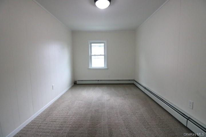 208 Center Street Ellenville, NY 12428 - Photo 12 of 13 an empty room with a window