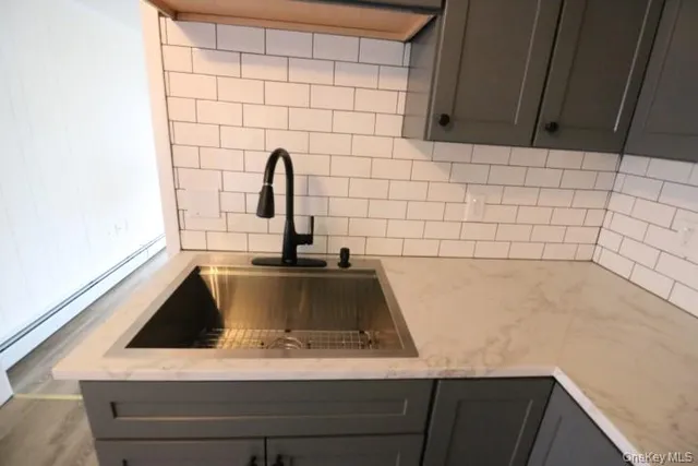 a close view of sink and stove