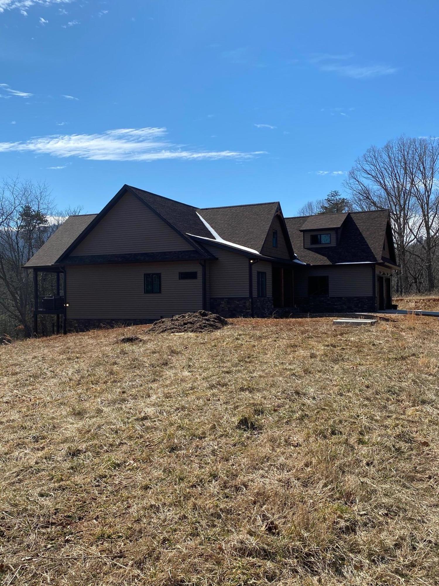 Lot 28 River Rock Road Vinton, VA 24179 - Photo 5 of 9 a front view of a house with a yard