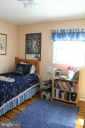 5705 Ashfield Road Alexandria, VA 22315 - Photo 19 of 28 a bedroom with bed and a window