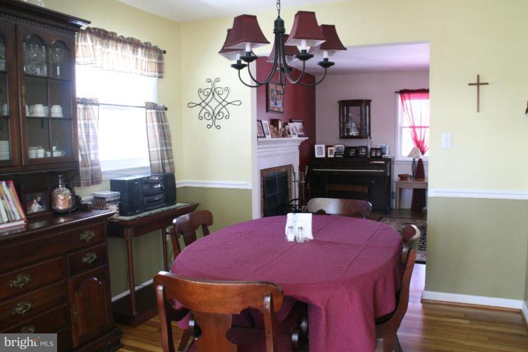 5705 Ashfield Road Alexandria, VA 22315 - Photo 8 of 28 a view of a dining room with furniture and window