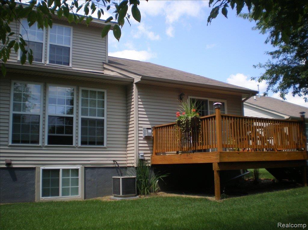 283 Wood Point, Unit 20 Howell, MI 48843 - Photo 19 of 22 summer deck 1