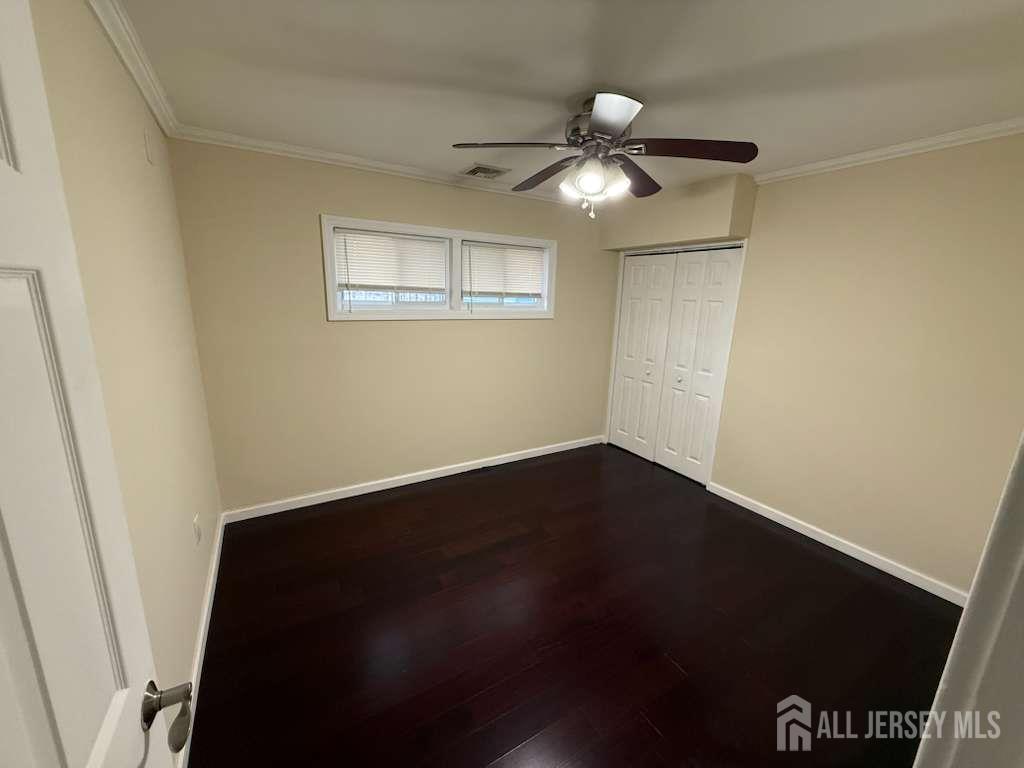 4 Rachel Terrace Piscataway, NJ 08854 - Photo 13 of 23 a view of an empty room with wooden floor