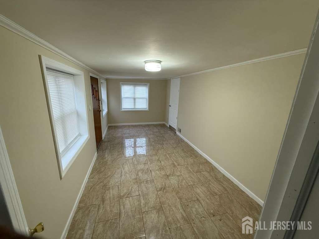 4 Rachel Terrace Piscataway, NJ 08854 - Photo 17 of 23 an empty room with windows