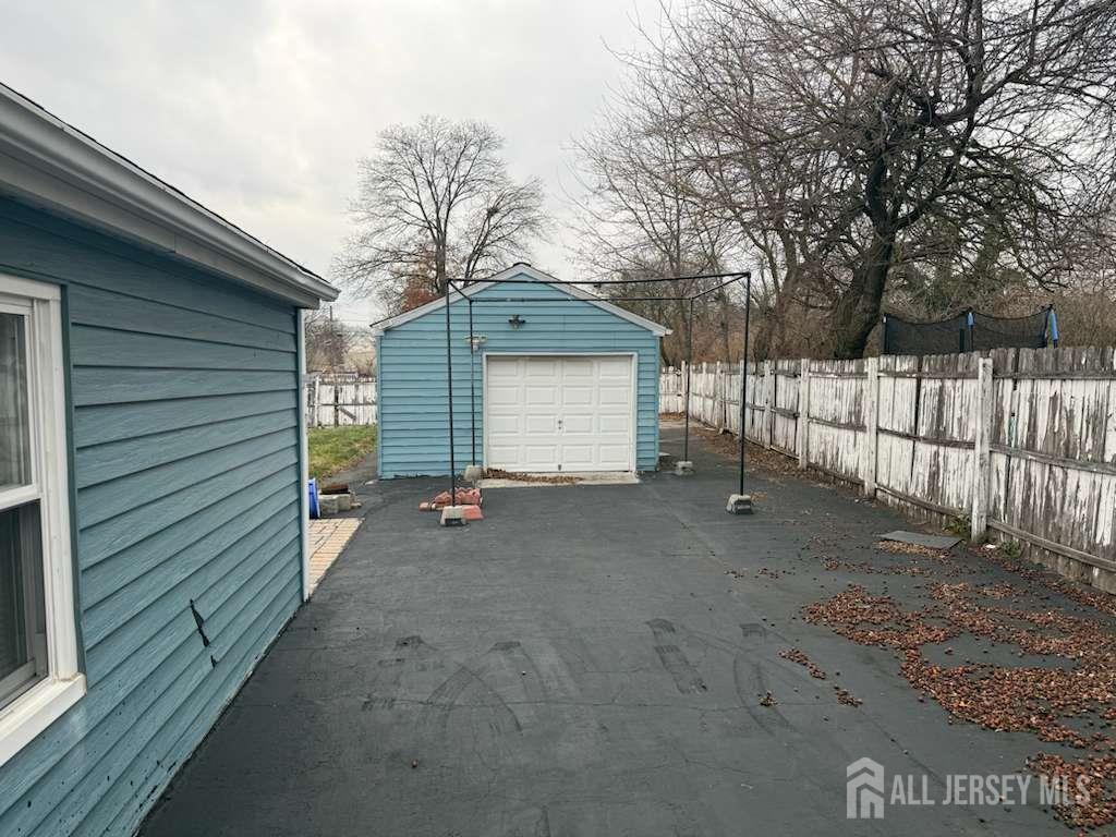 4 Rachel Terrace Piscataway, NJ 08854 - Photo 3 of 23 a view of a house with a garage