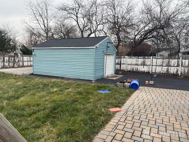 a view of a backyard with a garden