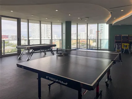a view of table tennis in a room